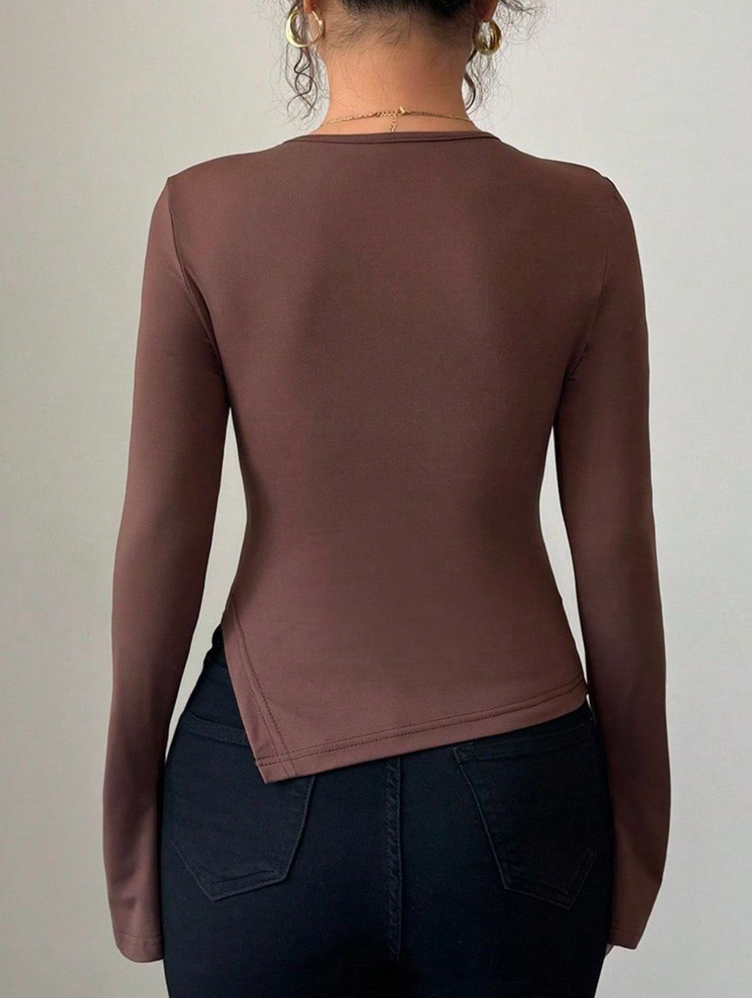 Asymmetrical openwork metal-decorated shirt