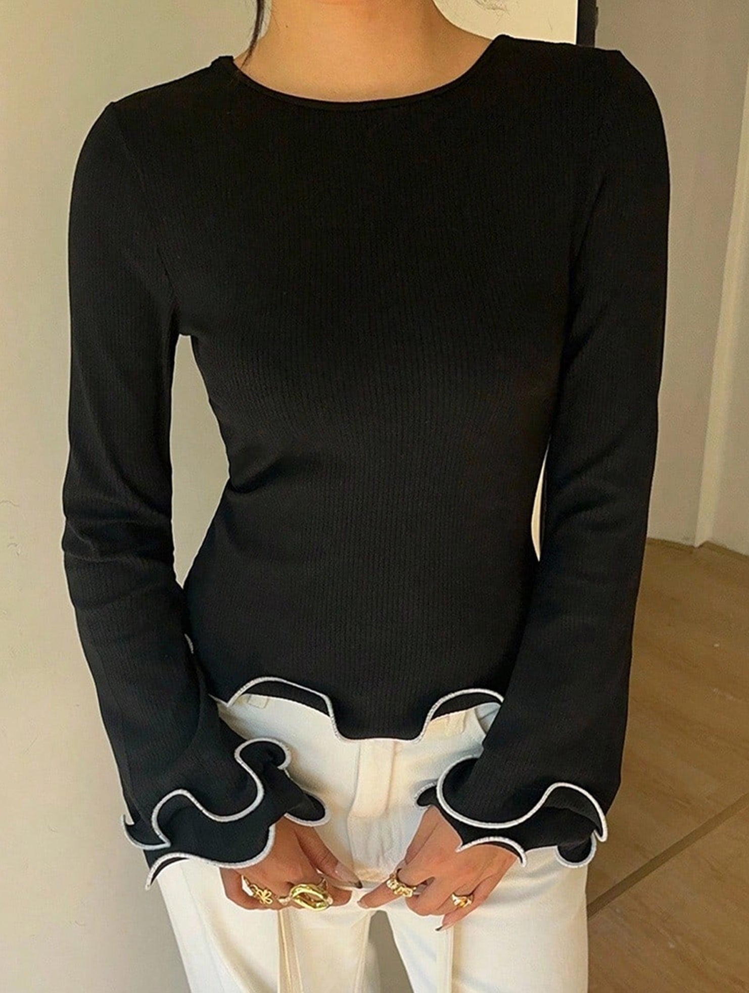 Color-blocked ruffled knit sweater