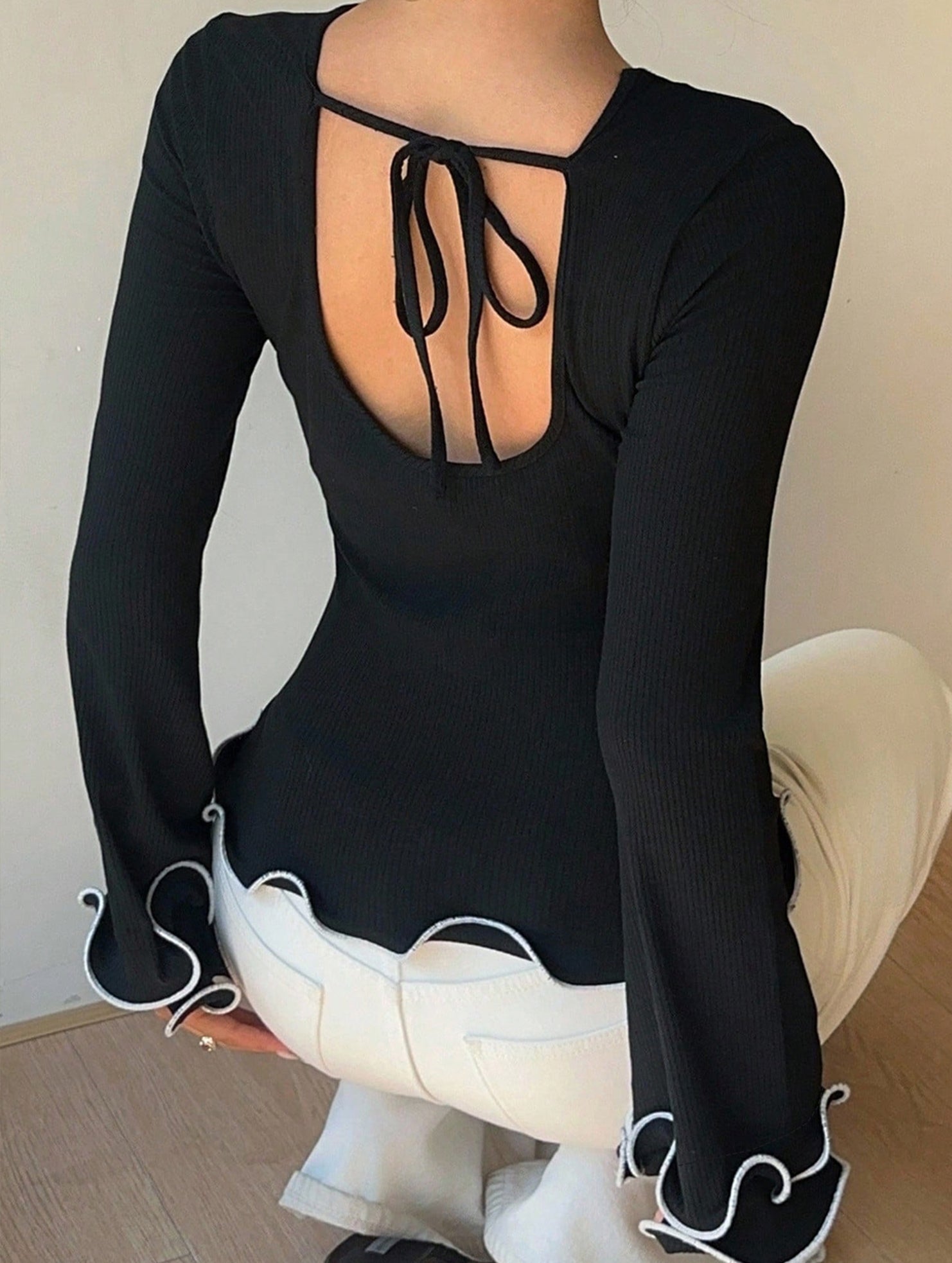 Color-blocked ruffled knit sweater