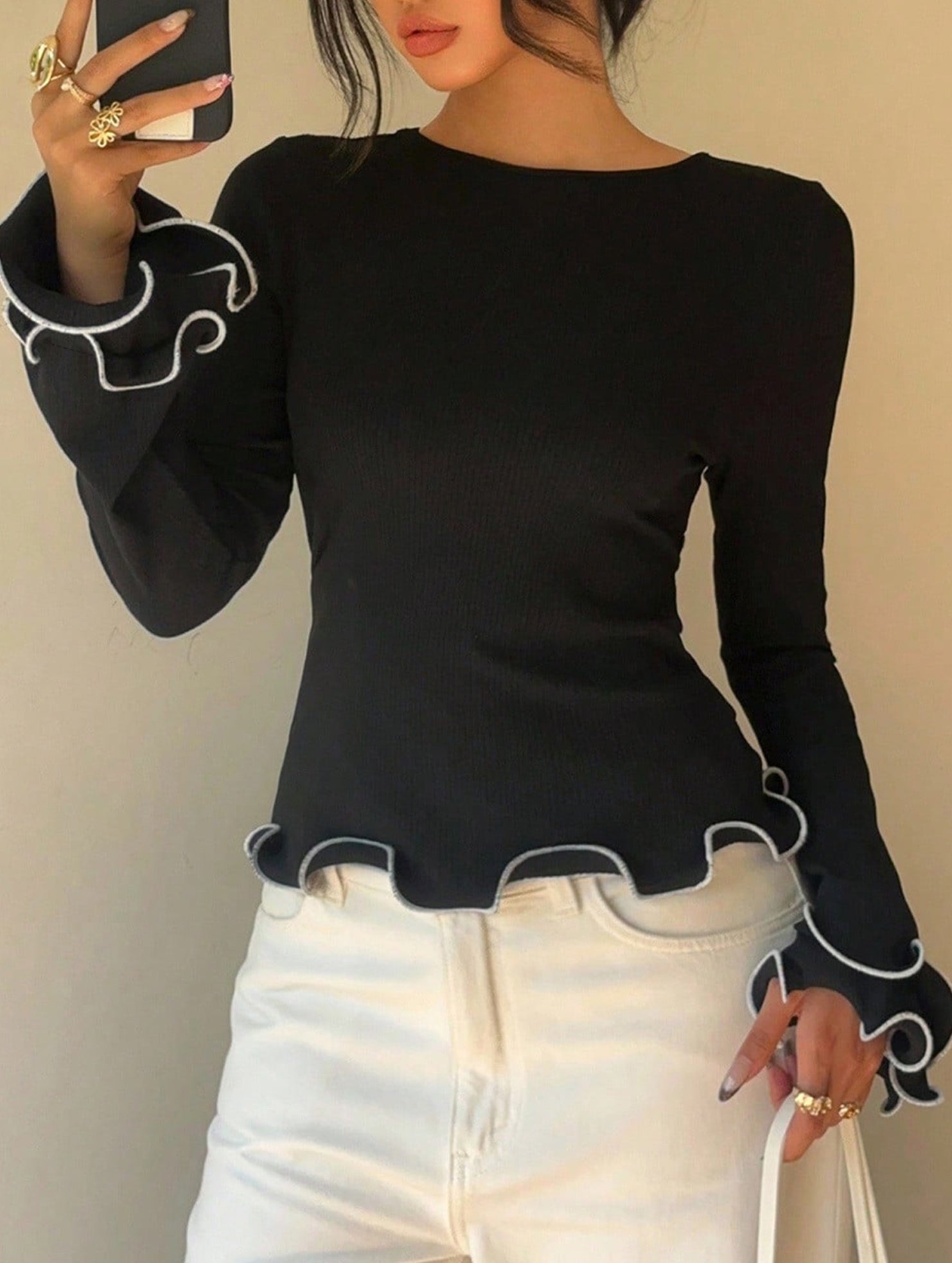 Color-blocked ruffled knit sweater