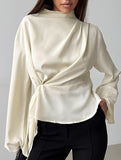 Waist-cinching long-sleeved slit shirt
