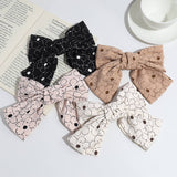 SIMPLE AND ELEGANT FLOWER DOT BOW CLIP_CWAHA2301