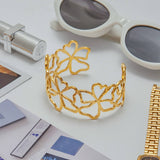 CHIC HOLLOW FLOWER CUFF 18K GOLD STAINLESS STEEL_CWAJE4734
