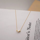 SMALL TEMPERAMENT PEARL CLAVICLE NECKLACE_CWAJE1669