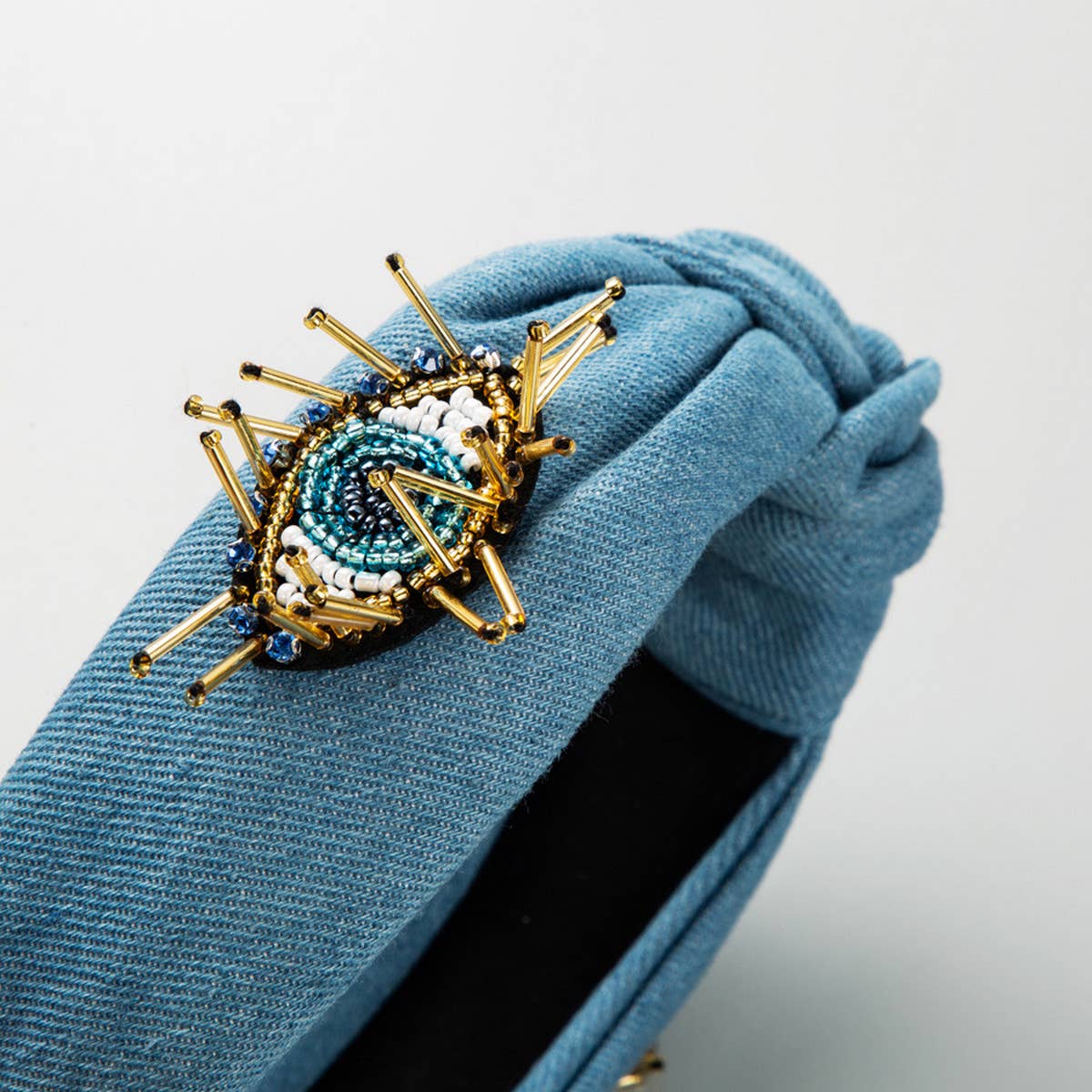 FASHIONABLE EVIL EYE DENIM HEADBAND_CWAHA2130