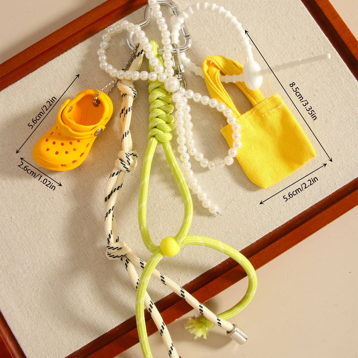 MINI HEADPHONE CASE KEYCHAIN BOW BAG CHARM_CWMM7871