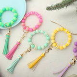 GLOW IN THE DARK WRISTBAND WITH TASSEL KEYCHAIN_CWMM6870