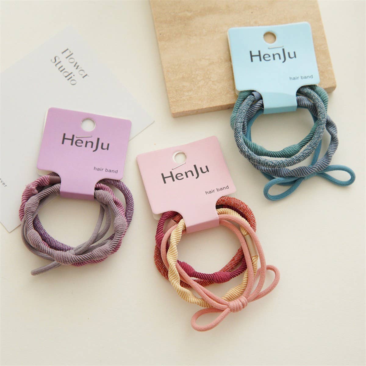 4 PIECES OF CANDY COLORED SIMPLE HAIR TIES_CWAHA1130