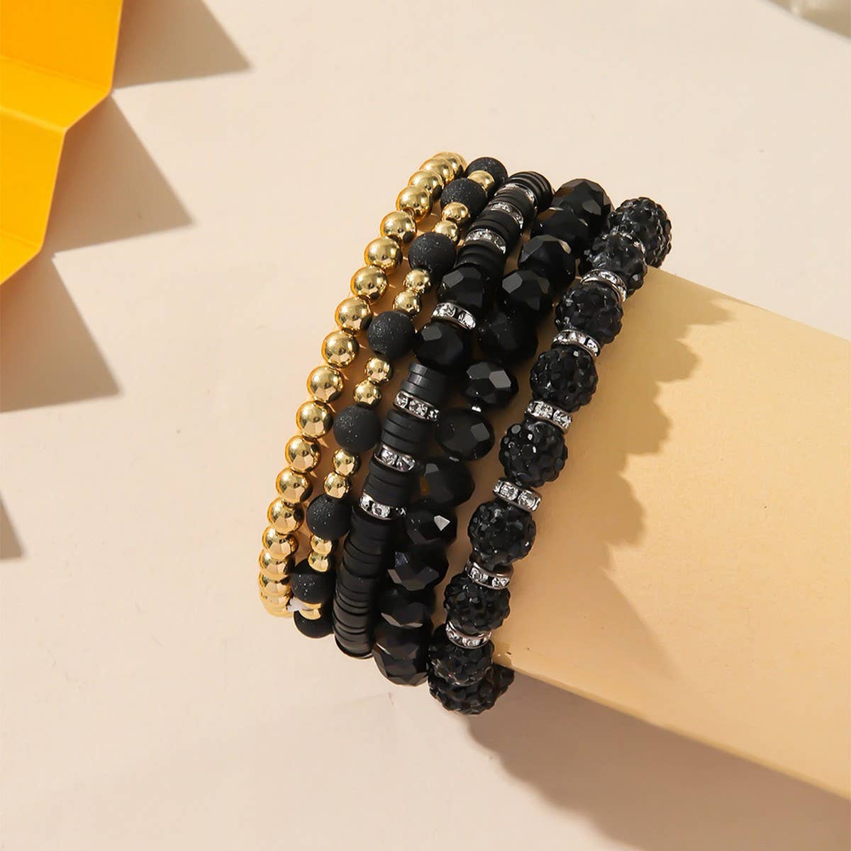 SIMPLE SET OF BLACK AND WHITE MULTI PIECE BRACELETS_CWMM3544