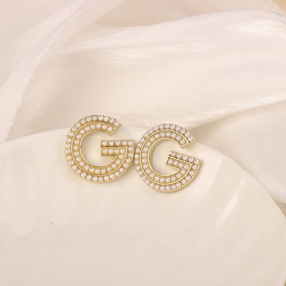 NEW SIMPLE HOLLOW FLOWER ENAMEL EARRINGS_CWAJE3991