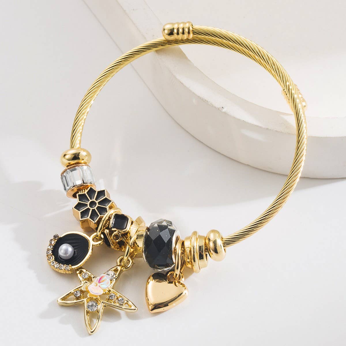 STAR SHELL CHARM ADJUSTABLE STAINLESS BRACELET_CWMM8494