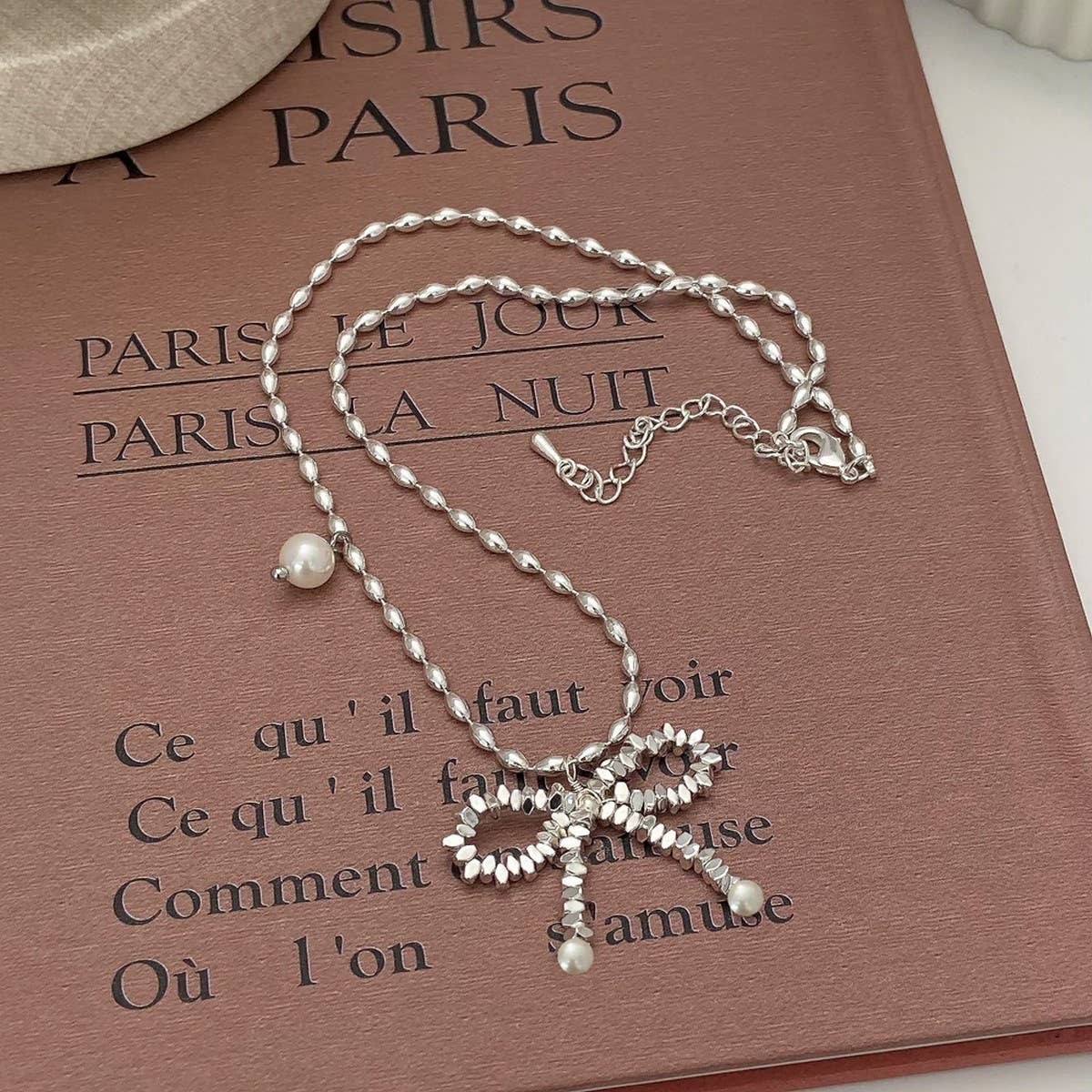 Womens Pearl And Silver Bow Pendant Necklace