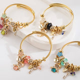 ANGEL KEY CHARM STEEL BRACELET FOR WOMEN_CWMM8474