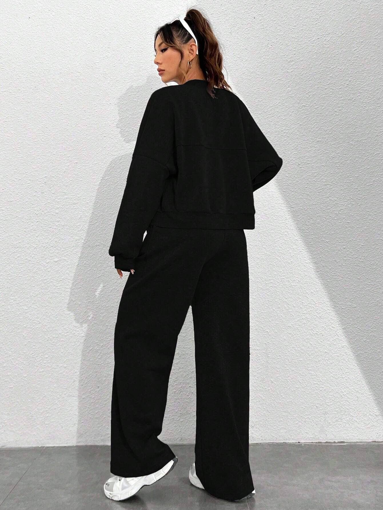 Two-Piece Set Of Zippered Cardigan And Trousers
