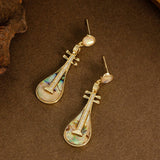DIAMOND ENCRUSTED ABALONE PIPA PENDANT EARRINGS_CWMM4286