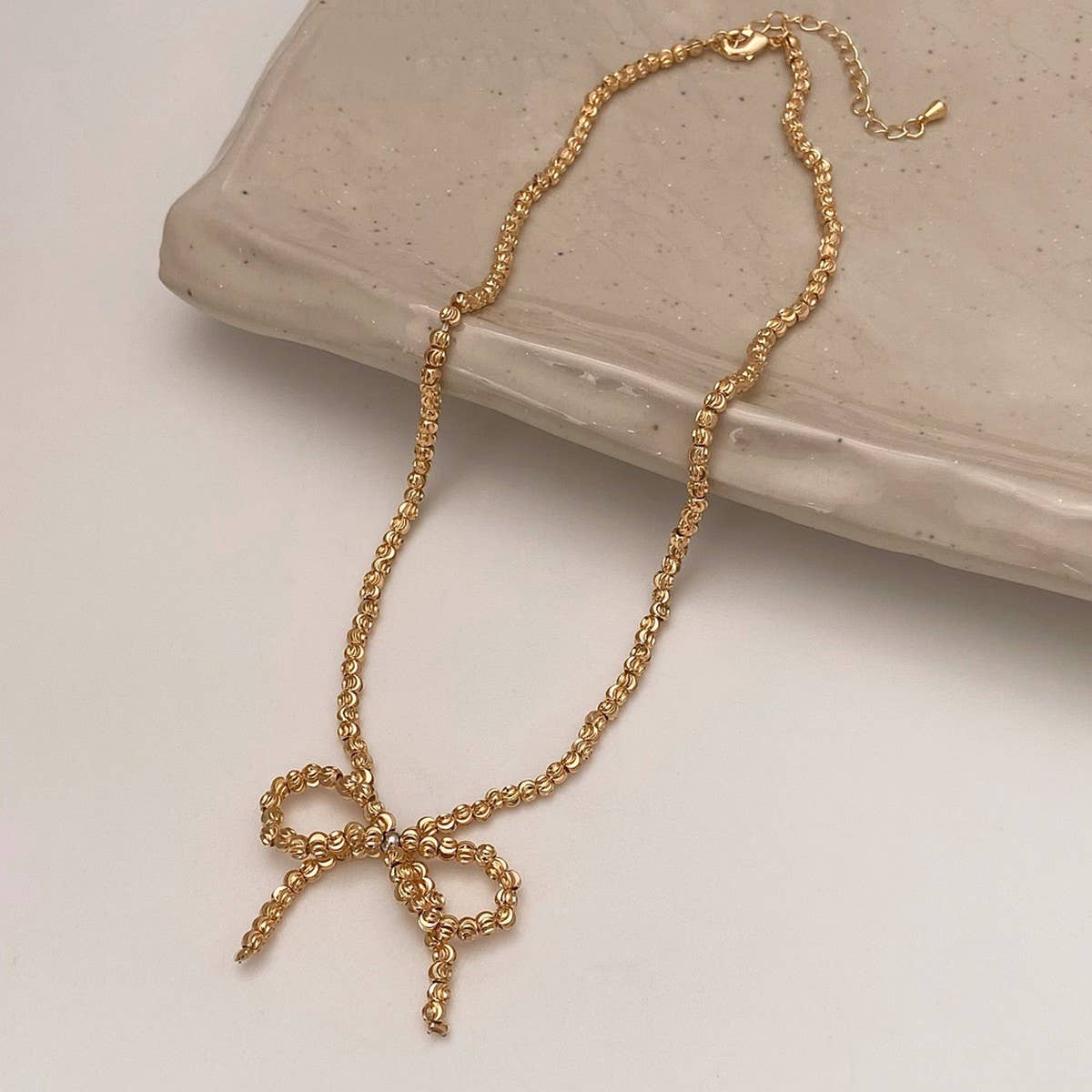 Wear High-End Metal Round Bead Bow Necklace