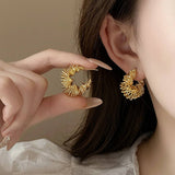 Twisted Hollow Shape Fashion Earrings_Cwasc1335