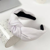 SOLID COLOR TEXTURED FABRIC CROSS HEADBAND_CWAHA2084