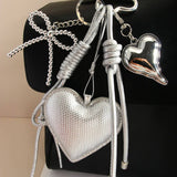ELEGANT SILVER HEART BOW BAG KEYCHAIN_CWMM7640