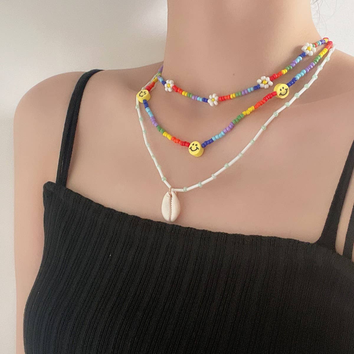 SHELL SMILEY DAISY BRAIDED NECKLACE_CWAJE1500