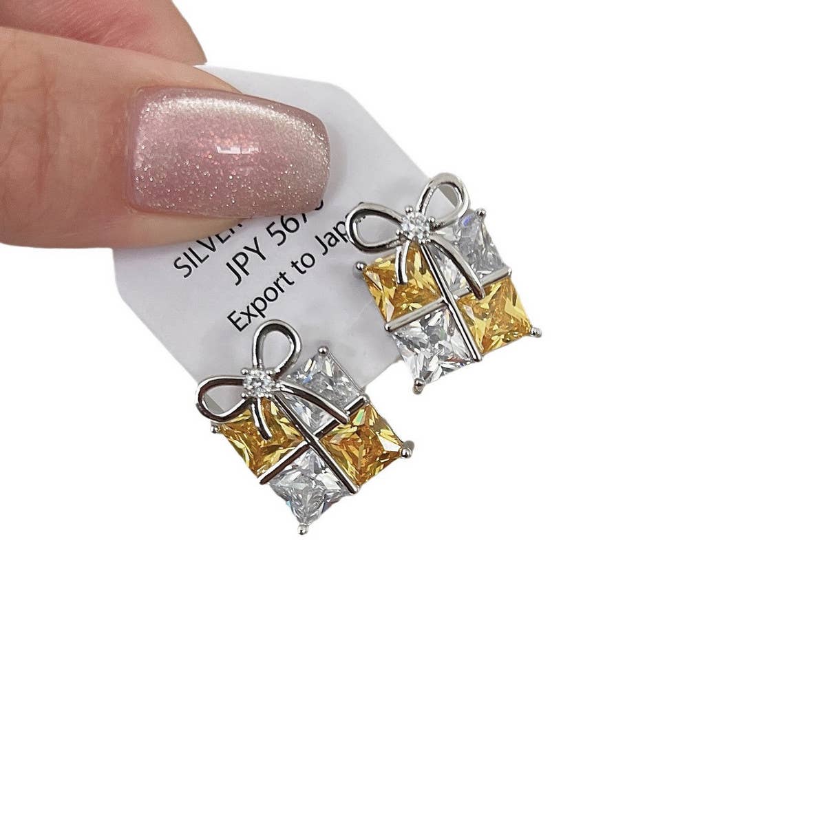 SQUARE ZIRCONIA BOW EARRINGS AND EARRINGS_CWAJE2029