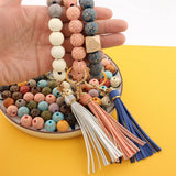 LEOPARD WOOD BEAD BRACELET KEYCHAIN WITH TASSEL_CWMM7016