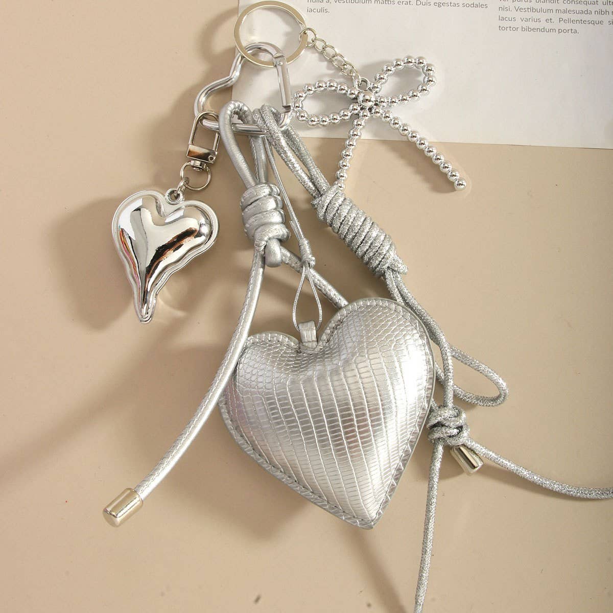 ELEGANT SILVER HEART BOW BAG KEYCHAIN_CWMM7640