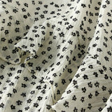 RUFFLE FLORAL SPLIT SLIMMING CAKE MIDI SKIRT_CWBMS0352