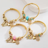 ADJUSTABLE STEEL BRACELET WITH BUTTERFLY CLOVER_CWMM8600