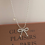 Womens Pearl And Silver Bow Pendant Necklace