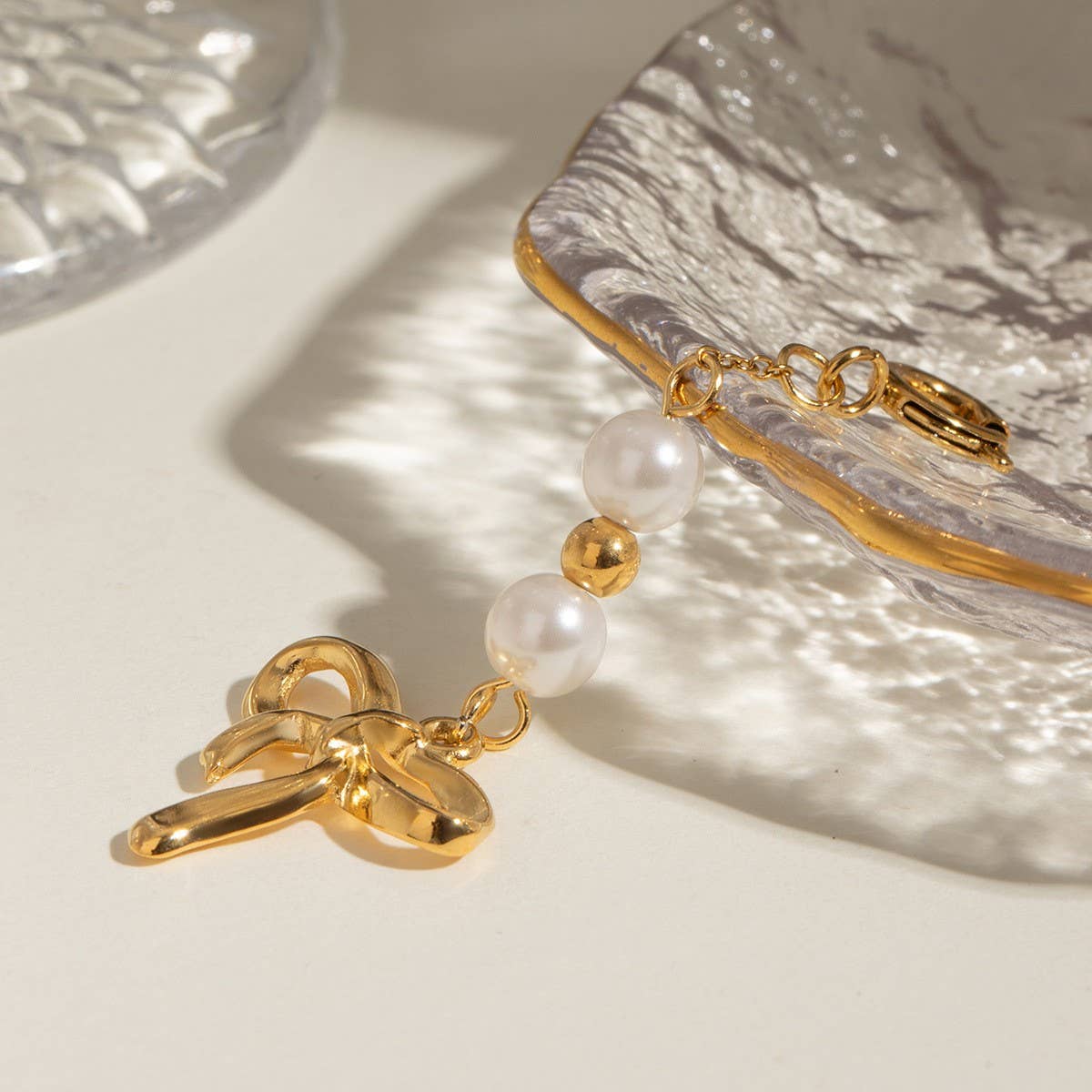 STAINLESS STEEL BIKINI BUCKLE BOW PEARL PENDANT_CWMM4690