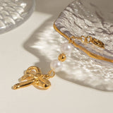 STAINLESS STEEL BIKINI BUCKLE BOW PEARL PENDANT_CWMM4690