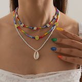 SHELL SMILEY DAISY BRAIDED NECKLACE_CWAJE1500