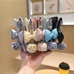 Textured Bow Pendant Bifold Wallet_Cwab06235