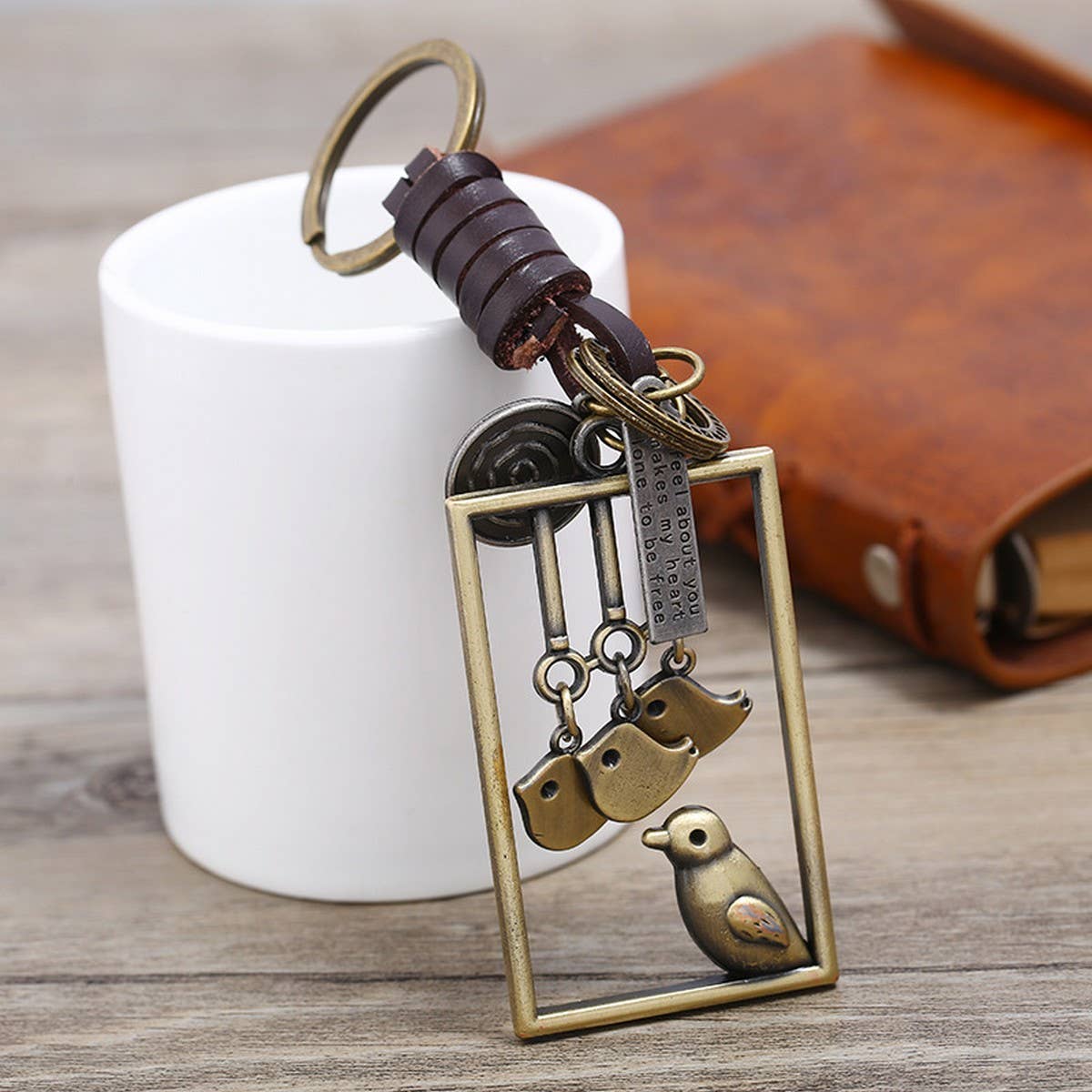 ALLOY BIRD PENDANT WOVEN LEATHER KEYCHAIN_CWMM5038