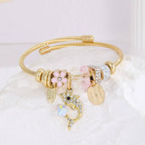 GOLD STAINLESS STEEL DOLPHIN TAIL BRACELET_CWMM8490