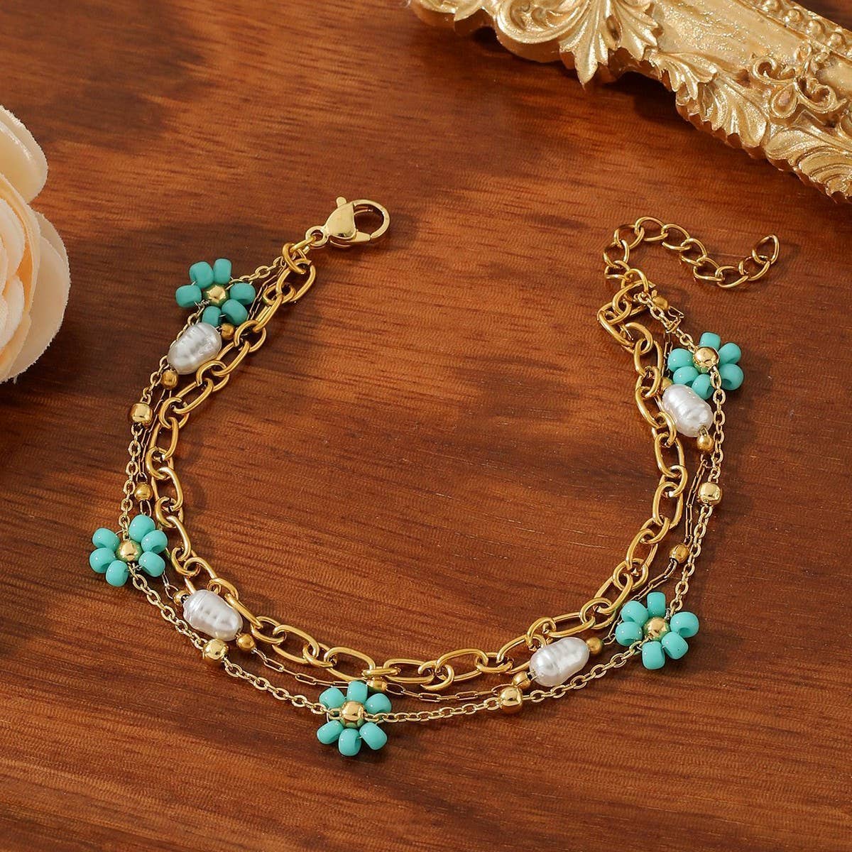 CRYSTAL PETALS 18K GOLD PLATED BRACELET_CWMM3728