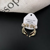 TEXTURE RIBBONS EARRINGS STUDS AND EARRINGS_CWAJE2023