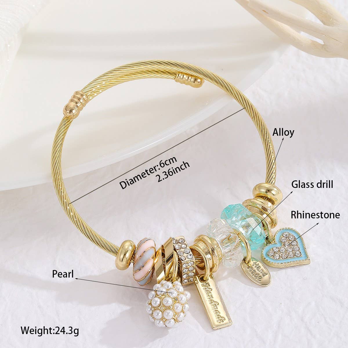 GOLD BRACELET WITH TREE HEART TAIL CHARMS_CWMM8620
