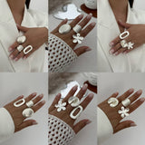 MINIMALIST ELASTIC ADJUSTMENT FLOWER ALLOY RING_CWMM3228