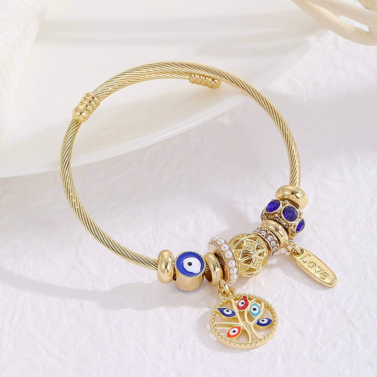 GOLD STAINLESS STEEL DOLPHIN TAIL BRACELET_CWMM8490