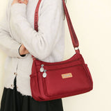 MULTI COMPARTMENT NYLON SHOULDER AND CROSSBODY BAG_CWASC1759