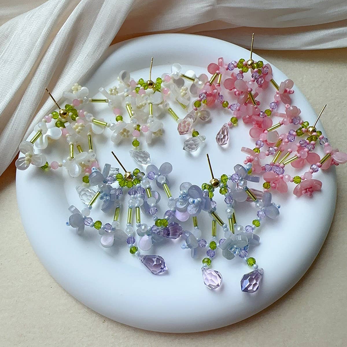 LIVELY AND PURE WATER DROP TASSEL EARRINGS_CWAJE1694