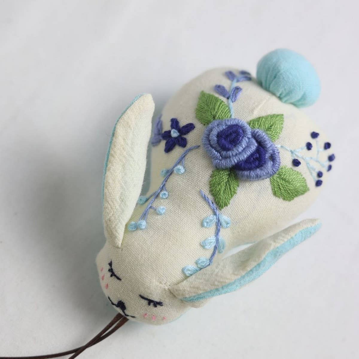 HAND EMBROIDERED BLUE ROSE BUNNY PLUSH CHARM_CWMM6006
