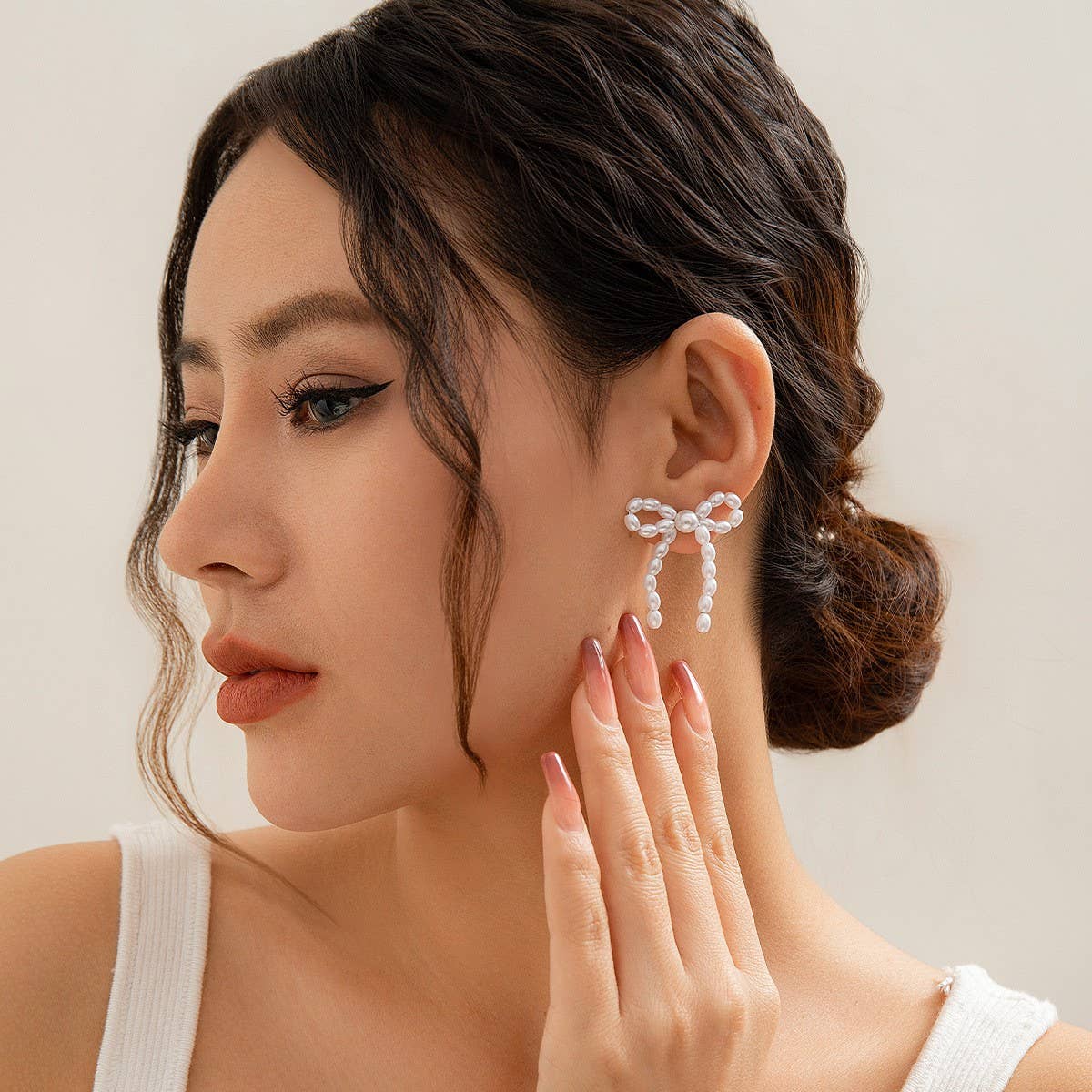 BOW FRENCH TASSEL PEARL EARRINGS_CWAJE1156