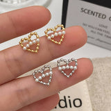 NEW EXQUISITE FASHION HOLLOW HEART PEARL EARRINGS_CWAJE3161