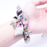 SIMPLE PEARL BOW HAIR TIE_CWAHA1074