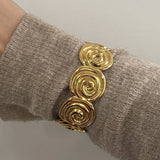 18K GOLD SPIRAL OPEN BANGLE TEXTURED STEEL_CWAJE4671