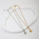 18K STAINLESS STEEL TEXTURED HEART NECKLACE_CWMM8889
