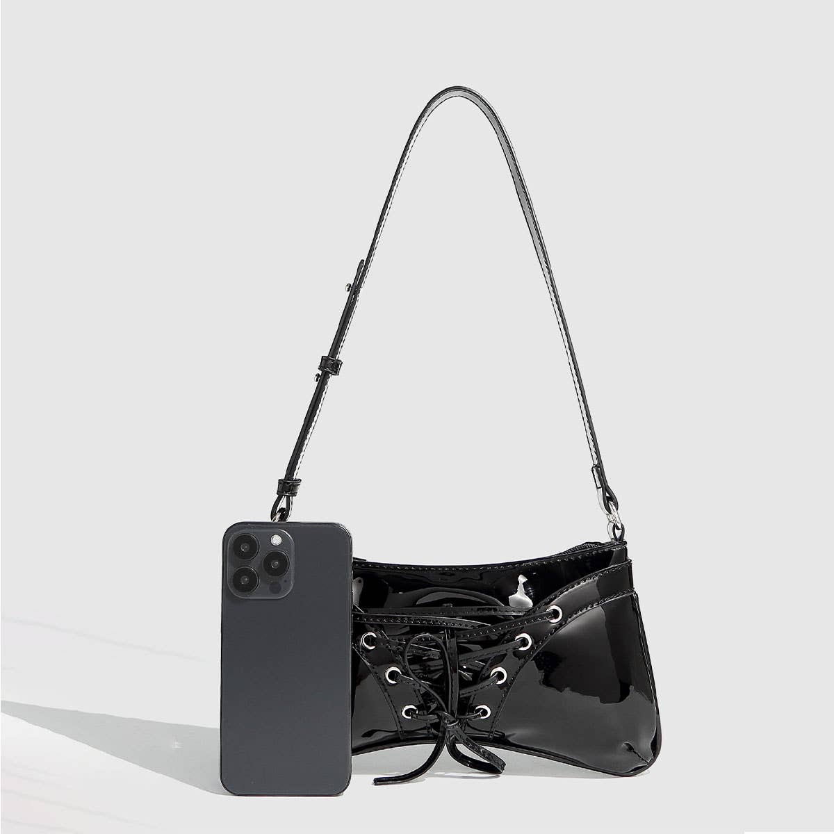 GLOSSY BOW STUDDED DRAWSTRING SHOULDER BAG_CWAB5704